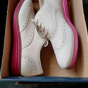 Cole Haan Cream Oxfords with Pink Sole.  These are new. Never worn.